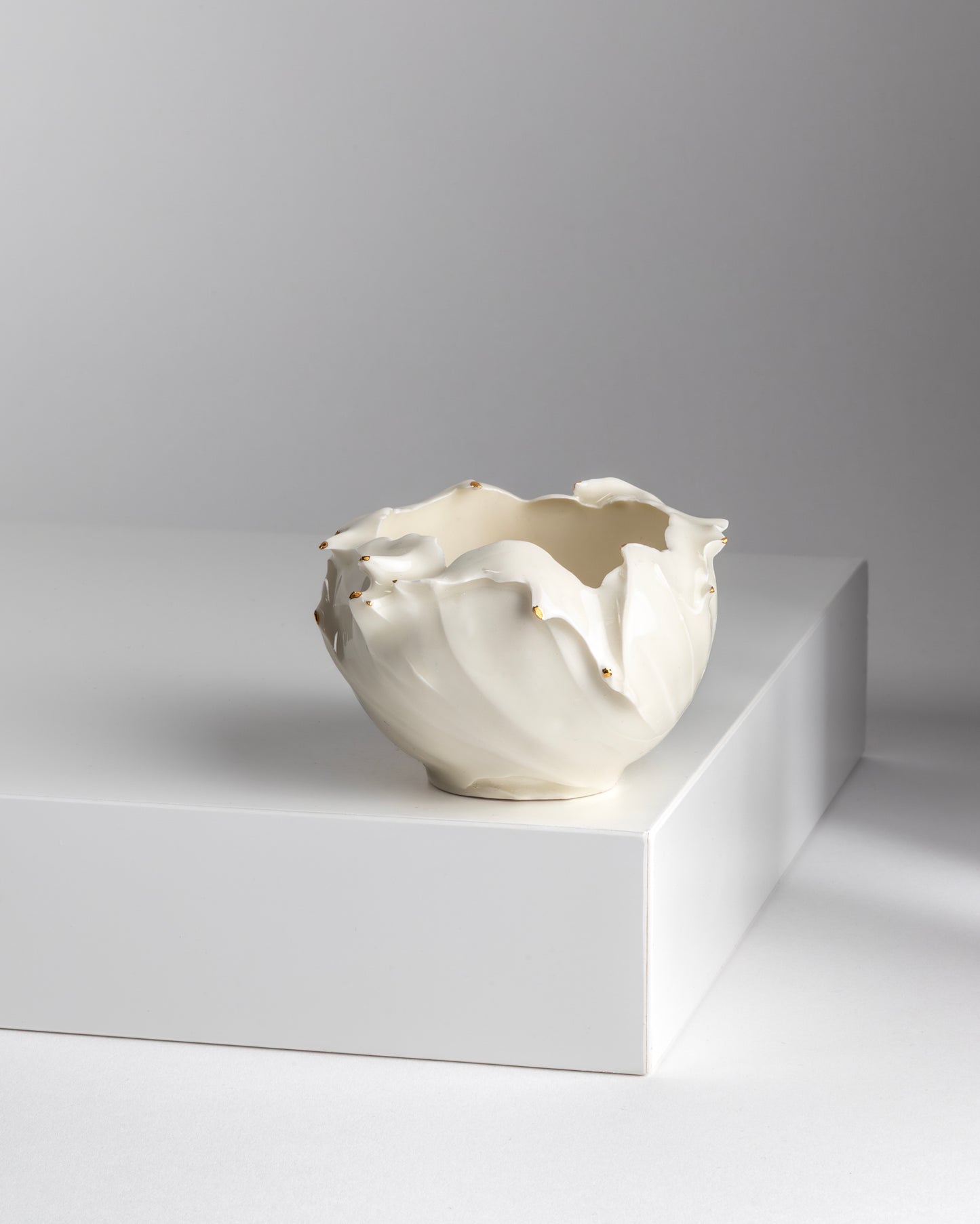 Porcelain and Gold Lustre Plash Cups