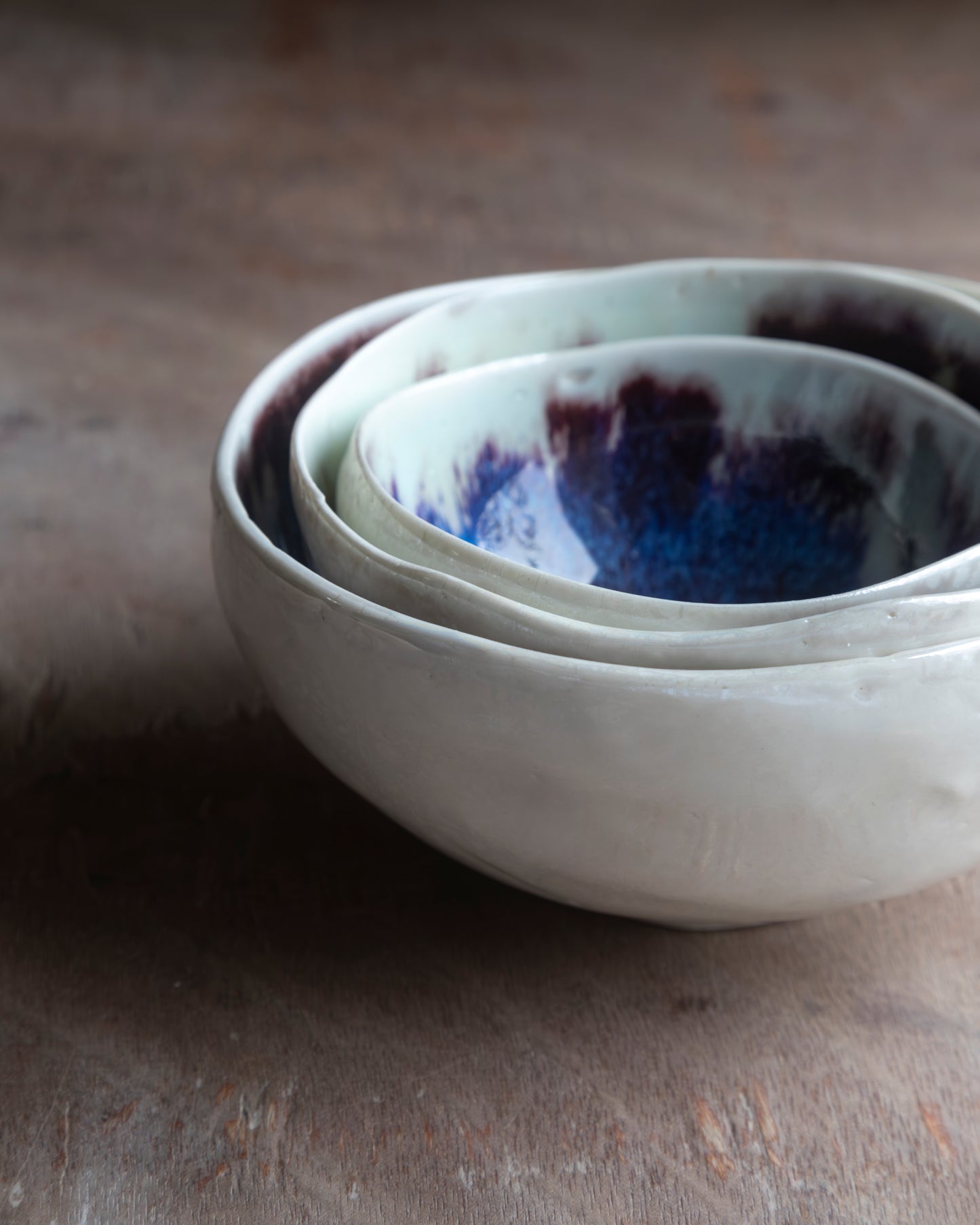 Porcelain Plash Bowl Set. Reactive Blue and Claret